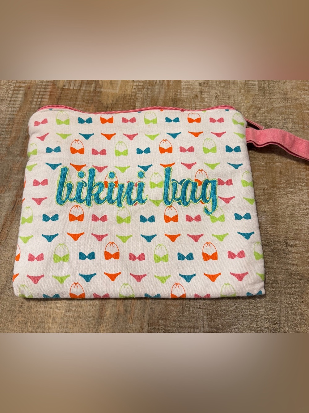 Bikini bag.Lined with zipper.
9”x10”